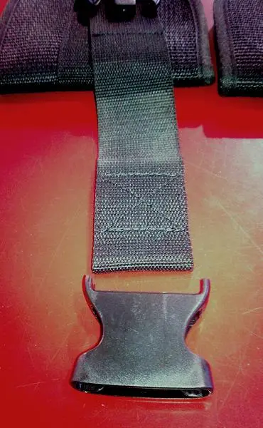 The plastic buckles can break, posing a fall hazard.