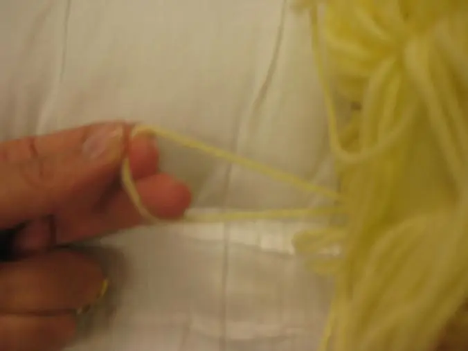 Photo from the official notice: Dolls Recalled by Pottery Barn Kids Due To Strangulation Hazard