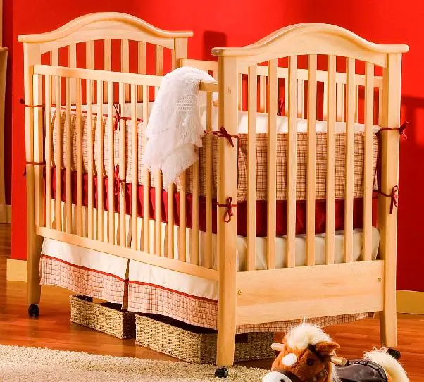 Photo from the official notice: Dutailier Group Recalls Drop-Side Cribs Due to Entrapment and Fall Hazards