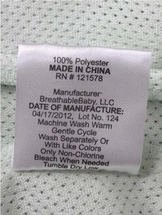 Tag with DATE OF MANUFACTURE 04/17/2012 and Lot No. 124