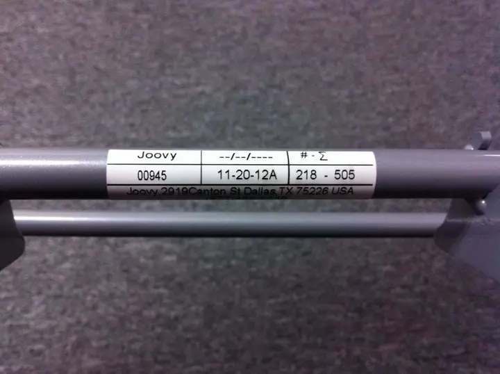 Label on Frame with Model Number.