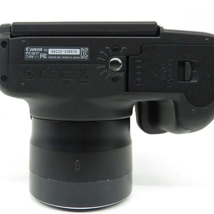 Side view of serial number plate on the Canon PowerShot SX50 HS Digital Camera