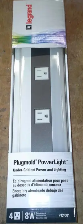 Legrand Wiremold under-cabinet power strip in the white packaging.