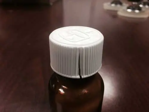 Close up view of the Temozolomide Capsules cracked cap rendering the child-resistant closure ineffective