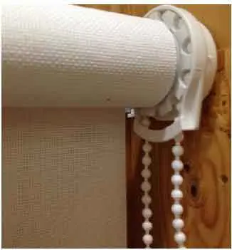 Recalled Carra Imports roller shade with a continuous loop bead chain