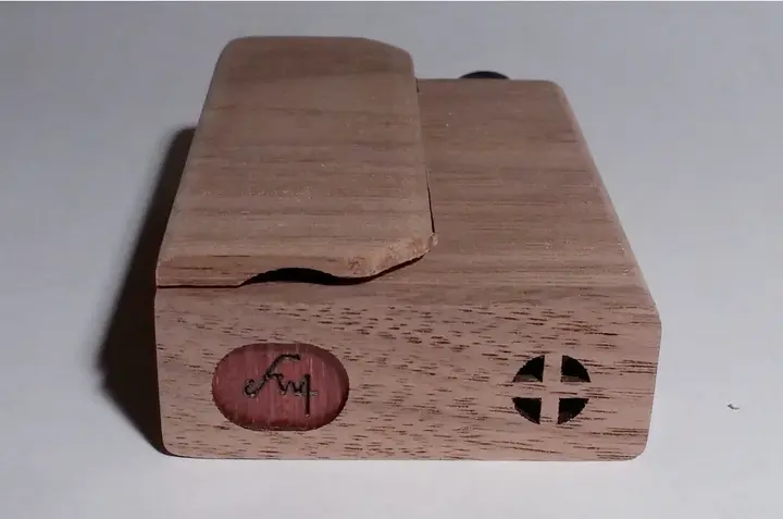 Bottom of recalled Firewood 4 vaporizer in unfinished walnut