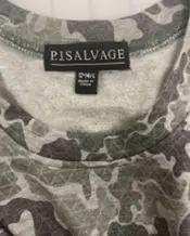 Sewn-in black fabric label at the neck states "P.J. Salvage," "Made in China," and size