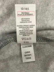 Second sewn-in, side-seam label with tracking code "09/2021 T2022"