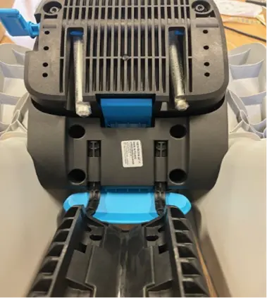 The product label located on the bottom of the child's bike seat
