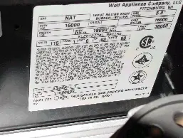 Recalled Wolf residential gas range sticker with serial number