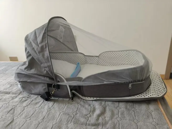 Recalled ZHORANGE Baby portable bassinet (left side)