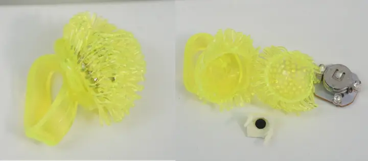 Recalled light-up assorted colors jelly rings (Item No. PS270) – Ring and close up showing accessible button cell batteries