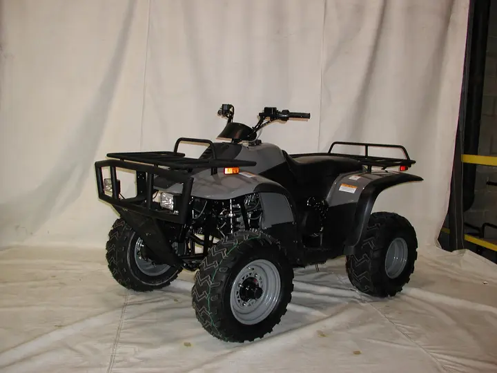 Off-center image of ATV - Front wheel-facing