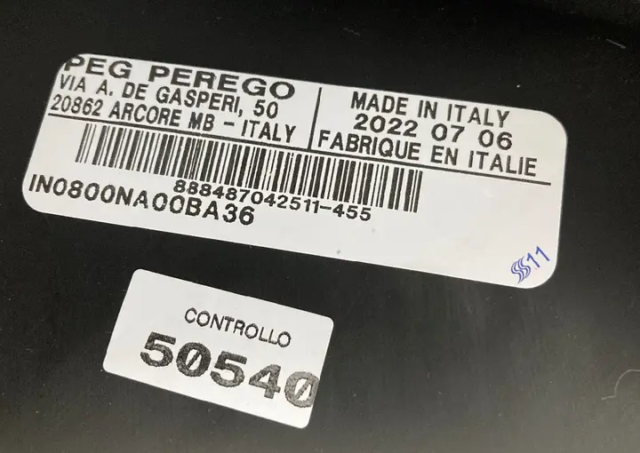 Label with date of manufacture and model number located in hood of recalled bassinets