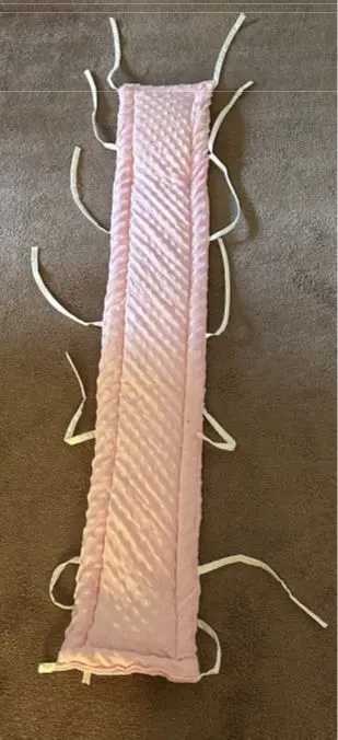 Recalled Padded Crib Bumper in the Color of Light Pink