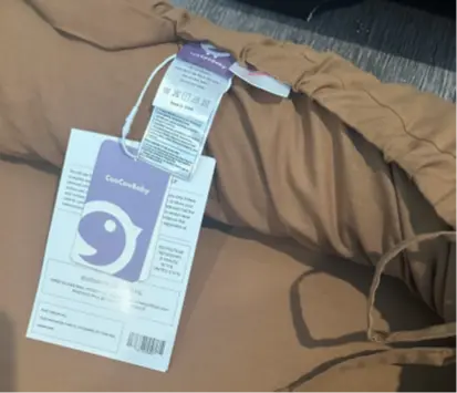 Tags showing "CooCooBaby" and the manufacturing information