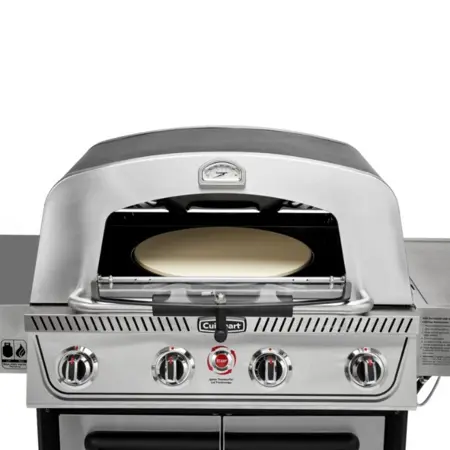 A close up of the pizza oven featured in the recalled grill, with the glass window open