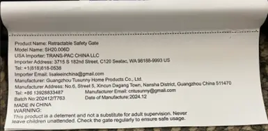 Label on the side of the recalled safety gate