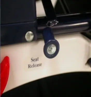 Seat release on recalled COSCO® "Rock 'N Roller" Baby Stroller
