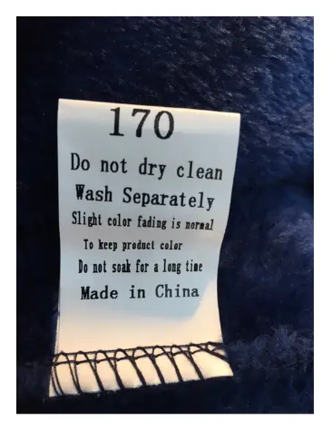 Made in China, the Chinese size designation and the washing instructions are printed on the neck label