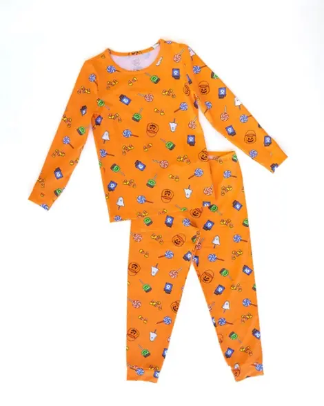 Recalled Two-Piece Pajamas in Orange Fabric with Candy Corn, Jack-O-Lantern Buckets, and Assorted Lollipops