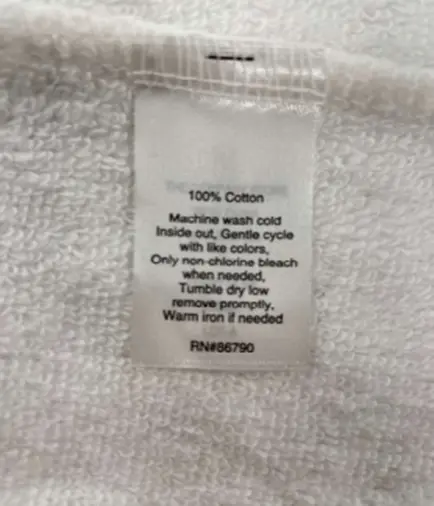 Recalled The Company Store Children's White Robes seam label