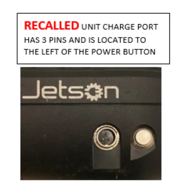 Charge port with three pins is located to the left of the power button on recalled Jetson Rogue Self-Balancing Scooter/Hoverboard