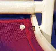 Plastic bolt cover on recalled Home Trends Kiddy Sling Chair