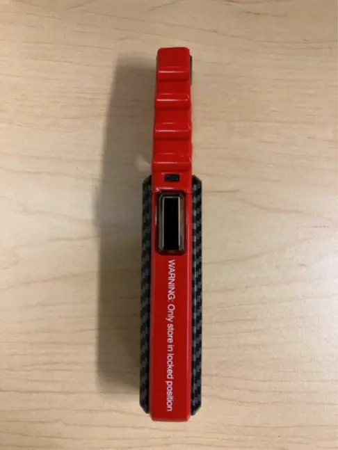 Recalled lighter warning label "WARNING: Only store in locked position"