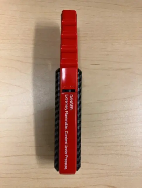Recalled lighter warning label "DANGER: Extremely Flammable, Content Under Pressure"