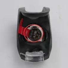 Recalled Qumeney Bicycle Light Sets - Button battery compartment position with red circled mark