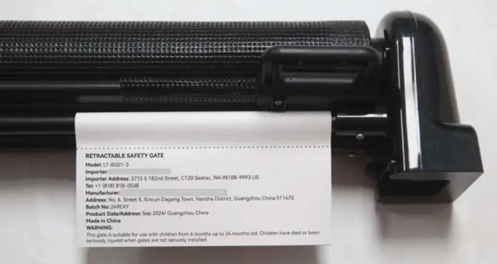 Model number printed on a white label on the side post of the recalled gate