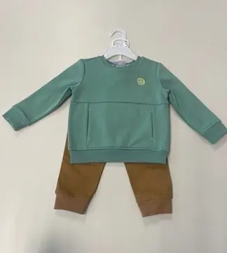 Recalled Pants with Green Crewneck Top