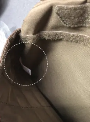 PO number and style number can be found inside the front pocket along the side seam (white dotted line)