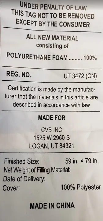 Federal tag located on the underside of the head panel of the mattress.