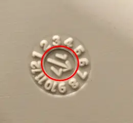 The two numbers in the middle next to the arrow represent the year of the manufacturing/date code. (Years 2013-2018 are recalled.)
