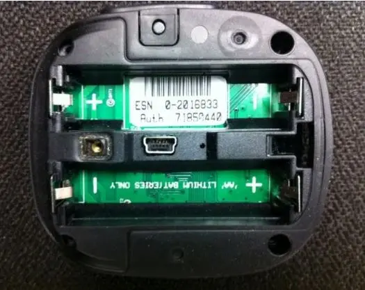 Recalled satellite communicator battery compartment showing the ESN label