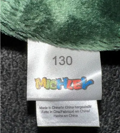 "Michley" and the size are printed on a sewn-in seam label