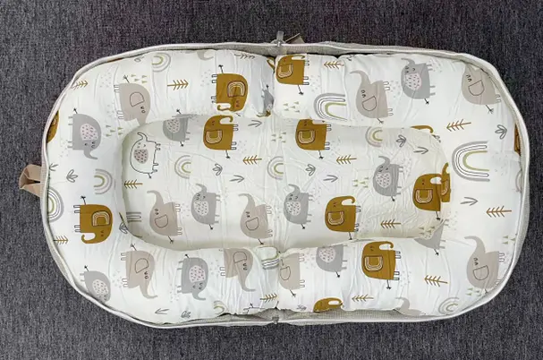 Recalled Glotika Baby Lounger in white-elephant