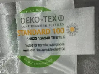 STANDARD 100 is printed on another tag inside the mattress cover