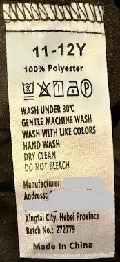 "Batch No.: 272779" and the size are printed on a sewn-in seam label