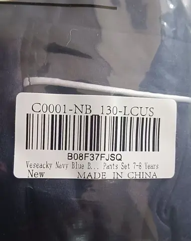 The model number "C0001-NB 130-LCUS" is on a barcode sticker on the packaging