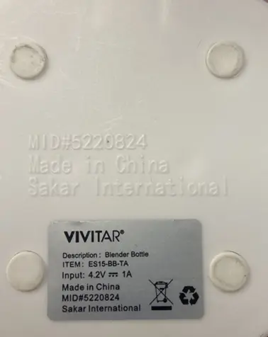 VIVITAR, "Description: Blender Bottle," "ITEM: ES15-BB-TA" and "MID #5220824" located under the white plastic base of the bottle