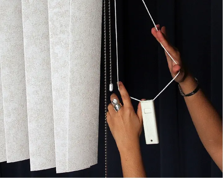 Recalled vertical window blind showing cord